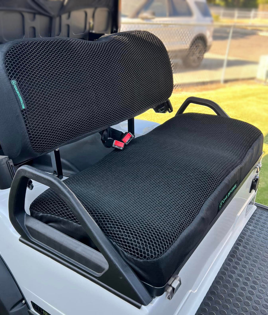 Cool Dry Covers golf cart seat covers feature a unique 3-dimensional mesh which keeps you raised off the seat for added comfort, staying much cooler in the heat and allowing beneficial air circulation. Water flows through without absorbing so you stay drier on the wet days. They are sized specifically for your golf cart seat and backrest. Shown here installed on an Evolution Classic golf cart.