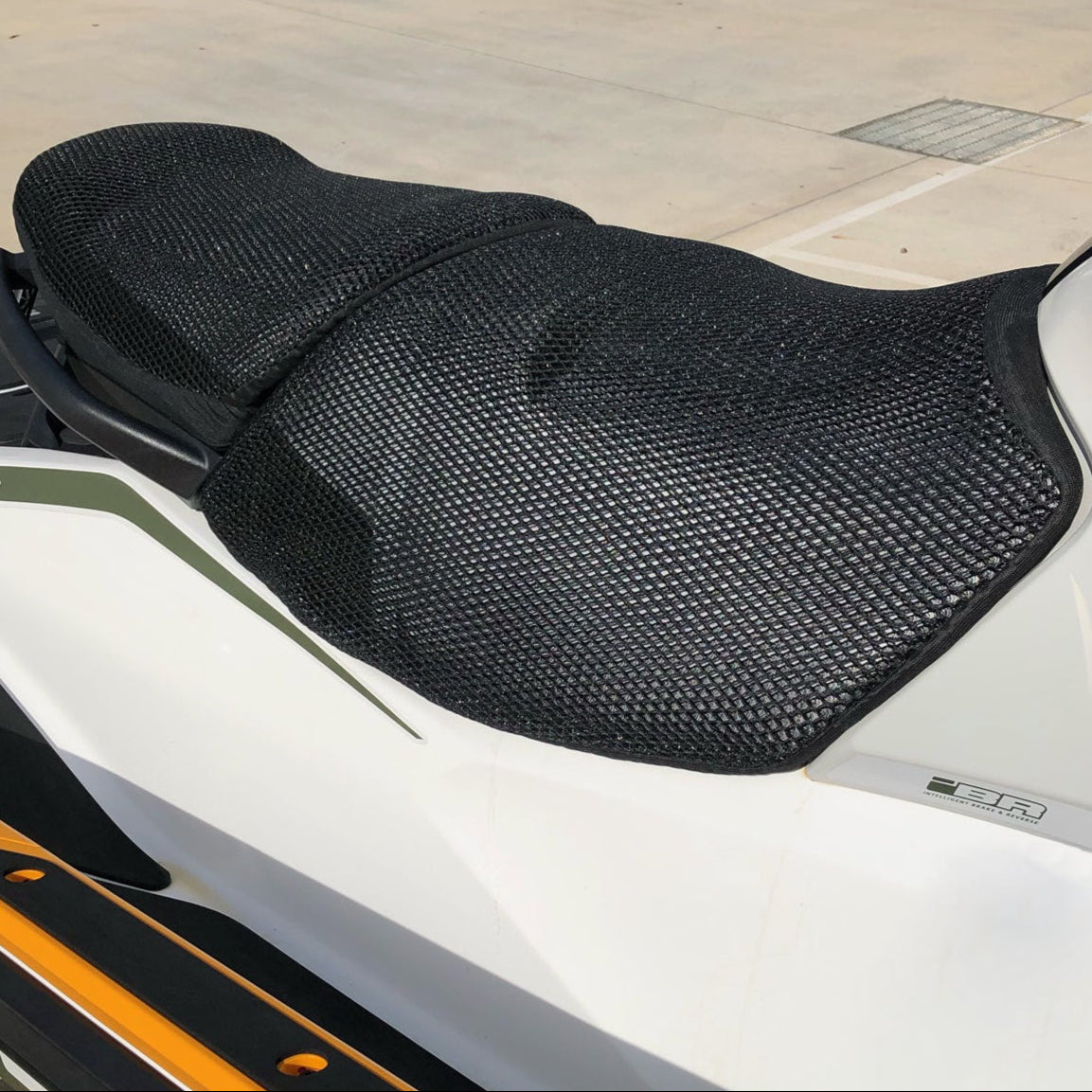 Cool Dry Covers jet ski seat covers feature a unique 3-dimensional mesh which keeps you raised off the seat for added comfort, staying much cooler in the heat and allowing beneficial air circulation. Water flows through without absorbing so you stay drier and more comfortable when on the water. Sized specifically for your jet ski seat.  Shown here installed on a Sea-Doo Fish Pro.