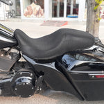 Cool Dry Covers seat covers to fit your Harley Street Glide (pictured).  Keeps you raised off the original seat, much cooler in the heat and allows air circulation.  Water goes through without being absorbed so you stay drier in the wet.  These are sized to fit your specific seat perfectly.  Transform your ride with Cool Dry Covers.