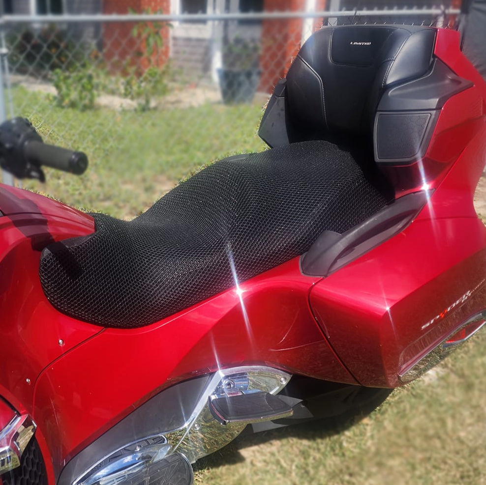 Cool Dry Covers motorbike seat covers feature a unique 3-dimensional mesh which keeps you raised off the seat for added comfort, staying much cooler in the heat and allowing beneficial air circulation. Water flows through without absorbing so you stay drier on the wet days. Sized specifically for your motorbike seat.  Shown here installed on a Can Am Spyder RT One Piece seat.