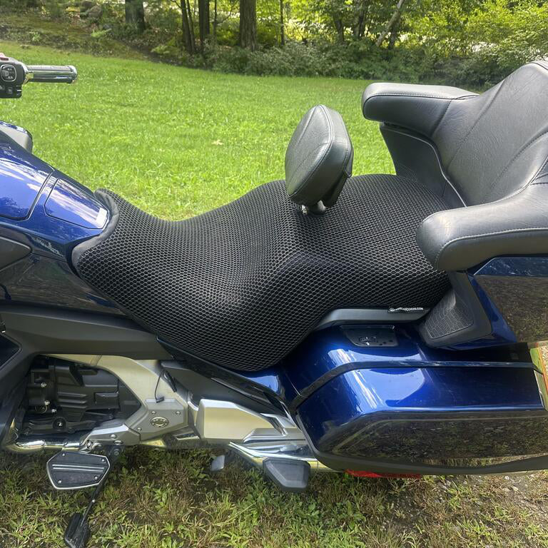 Cool Dry Covers seat covers to fit your Honda Goldwing Ultimate (pictured).  Keeps you raised off the original seat, much cooler in the heat and allows air circulation.  Water goes through without being absorbed so you stay drier in the wet.  These are sized to fit your specific seat perfectly.  Transform your ride with Cool Dry Covers.