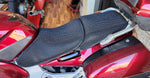 Cool Dry Covers seat covers to fit your Honda ST1300 (pictured).  Keeps you raised off the original seat, much cooler in the heat and allows air circulation.  Water goes through without being absorbed so you stay drier in the wet.  These are sized to fit your specific seat perfectly.  Transform your ride with Cool Dry Covers.